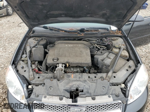 2012 Chevrolet Impala LT Retail with VIN 2G1WB5E32C1300905, listed as a Copart auction lot 51170975 with 164,345 mi miles and Salvage Title. Bid and sale history available at DreamBid. Image 12.