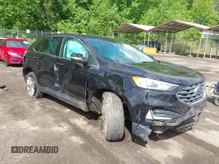 2022 Ford Edge Titanium with VIN 2FMPK4K95NBA45450, listed as a IAAI auction lot 42149752 with Not provided miles and . Bid and sale history available at DreamBid. Image 1.