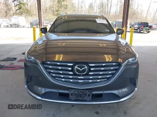 2021 Mazda CX-9 Signature with VIN JM3TCBEY9M0504963, listed as a IAAI auction lot 41756255 with 49,946 mi miles. Bid and sale history available at carsss.com. Image 11.
