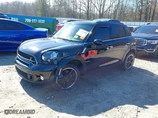 2015 MINI Cooper Countryman S with VIN WMWZC3C5XFWT04916, listed as a IAAI auction lot 41636369 with 101,448 mi miles. Bid and sale history available at carsss.com. Image 18.