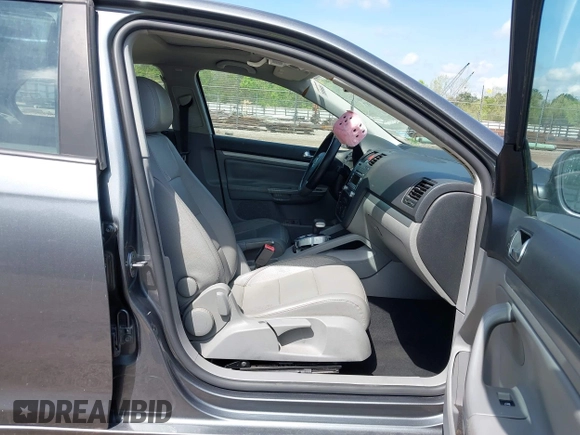 2008 Volkswagen Jetta Sedan Wolfsburg with VIN 3VWRJ71K58M185147, listed as a IAAI auction lot 42076387 with 193,621 mi miles. Bid and sale history available at carsss.com. Image 5.