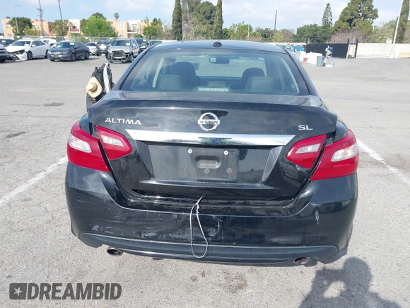2018 Nissan Altima SR with VIN 1N4AL3AP7JC279459, listed as a IAAI auction lot 41901831 with 104,798 mi miles and . Bid and sale history available at DreamBid. Image 16.