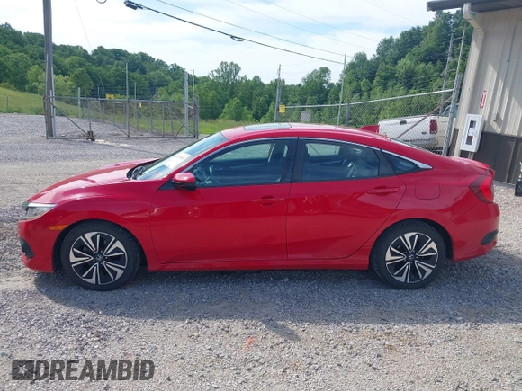 2016 Honda Civic EX-L z VIN 2HGFC1F74GH652090, wystawiony jako IAAI lot #42253881 z przebiegiem 127 863 mil mil oraz . Historia ofert i sprzedaży dostępna na DreamBid. Obrazek 14.