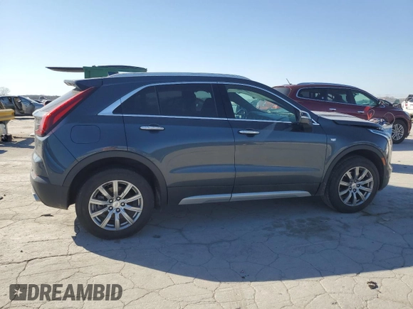 2021 Cadillac XT4 AWD Premium Luxury with VIN 1GYFZDR47MF002175, listed as a Copart auction lot 48303665 with 94,698 mi miles and Salvage Title. Bid and sale history available at carsss.com. Image 3.