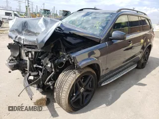 2015 Mercedes-Benz GL-Class GL 550 with VIN 4JGDF7DE7FA561521, listed as a Copart auction lot 56681512 with 67,329 mi miles. Bid and sale history available at carsss.com. Image 2.