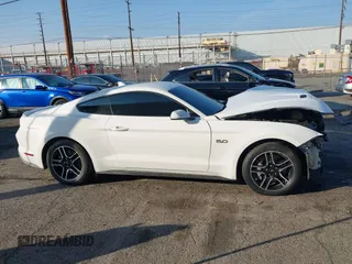 2021 Ford Mustang GT with VIN 1FA6P8CF1M5110879, listed as a IAAI auction lot 41451066 with 61,243 mi miles and . Bid and sale history available at DreamBid. Image 13.