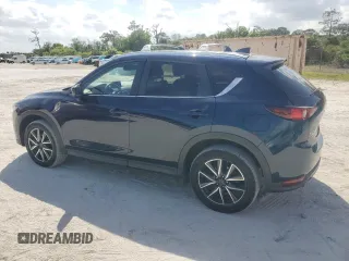 2018 Mazda CX-5 Touring with VIN JM3KFACM5J0419207, listed as a Copart auction lot 51123855 with 75,831 mi miles and Salvage Title. Bid and sale history available at carsss.com. Image 2.