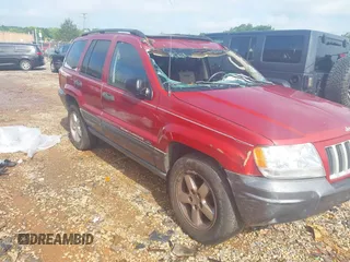 2004 Jeep Grand Cherokee Laredo with VIN 1J4GW48S34C419596, listed as a IAAI auction lot 42515494 with 276,196 mi miles and . Bid and sale history available at DreamBid. Image 1.