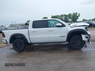 2020 Ram 1500 Big Horn with VIN 1C6SRFFT0LN105011, listed as a IAAI auction lot 42512812 with 71,825 mi miles and . Bid and sale history available at DreamBid. Image 13.