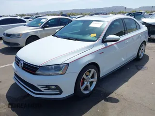 2017 Volkswagen Jetta GLI z VIN 3VW5T7AJ3HM257978, wystawiony jako IAAI lot #41855055 z przebiegiem 177 344 mil mil oraz . Historia ofert i sprzedaży dostępna na DreamBid. Obrazek 18.