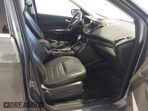2016 Ford Escape Titanium with VIN 1FMCU9J9XGUC30596, listed as a IAAI auction lot 42024166 with 179,340 mi miles. Bid and sale history available at carsss.com. Image 5.
