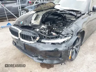 2022 BMW 3 Series 330i with VIN 3MW5R1J08N8C37393, listed as a IAAI auction lot 41712629 with 37,423 mi miles and . Bid and sale history available at DreamBid. Image 6.