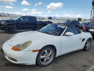 1999 Porsche Boxster z VIN WP0CA2984XU629987, wystawiony jako Copart lot #51366845 z przebiegiem Nie podano mil oraz Czysty tytuł • Clean title. Historia ofert i sprzedaży dostępna na DreamBid. Obrazek 1.