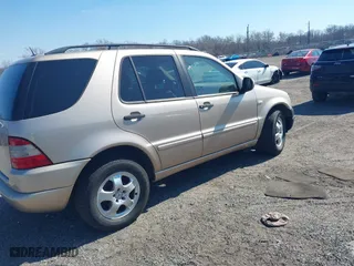 2001 Mercedes-Benz M-Class with VIN 4JGAB54E71A245256, listed as a IAAI auction lot 41697960 with 191,911 mi miles. Bid and sale history available at carsss.com. Image 4.