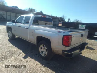 2014 Chevrolet Silverado 1500 LT with VIN 1GCVKREC7EZ120159, listed as a IAAI auction lot 41191282 with 206,836 mi miles and . Bid and sale history available at DreamBid. Image 3.