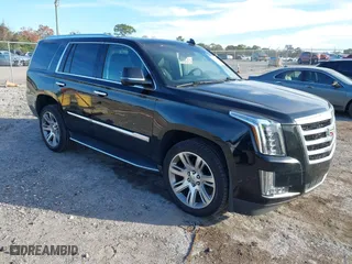 2018 Cadillac Escalade Luxury with VIN 1GYS3BKJ7JR291430, listed as a IAAI auction lot 41449233 with 128,281 mi miles. Bid and sale history available at carsss.com. Image 1.