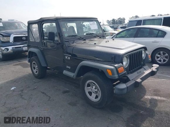 2002 Jeep Wrangler X with VIN 1J4FA39S92P774054, listed as a IAAI auction lot 41470351 with 209,727 mi miles. Bid and sale history available at carsss.com. Image 1.