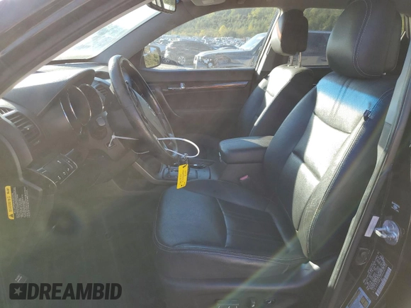 2013 Kia Sorento SX z VIN 5XYKWDA24DG385142, wystawiony jako Copart lot #75187514 z przebiegiem 119 027 mil mil oraz Szkoda całkowita • Salvage title. Historia ofert i sprzedaży dostępna na DreamBid. Obrazek 7.