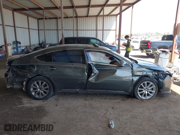 2014 Toyota Avalon Limited with VIN 4T1BK1EB0EU121139, listed as a IAAI auction lot 41987229 with 91,782 mi miles. Bid and sale history available at carsss.com. Image 13.