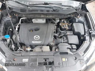 2014 Mazda CX-5 Grand Touring with VIN JM3KE4DY5E0373731, listed as a IAAI auction lot 41517852 with 148,414 mi miles. Bid and sale history available at carsss.com. Image 10.