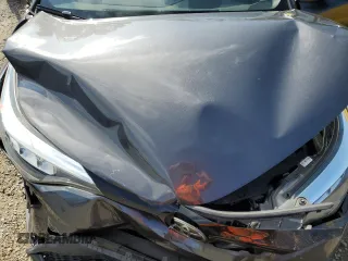 2021 Toyota C-HR LE z VIN NMTKHMBX1MR121205, wystawiony jako Copart lot #52317525 z przebiegiem 73 654 mil mil oraz Nie do naprawy. Historia ofert i sprzedaży dostępna na DreamBid. Obrazek 13.