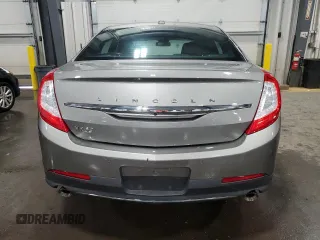 2016 Lincoln MKS с VIN 1LNHL9DK3GG600907, выставлен на аукционе Copart как лот 56892995 с пробегом 122 220 миль миль и Списание • Salvage title. История ставок и продаж доступна на DreamBid. Изображение 6.