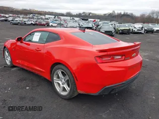 2017 Chevrolet Camaro 1LT z VIN 1G1FA1RX2H0119847, wystawiony jako IAAI lot #41936497 z przebiegiem 125 711 mil mil oraz . Historia ofert i sprzedaży dostępna na DreamBid. Obrazek 3.