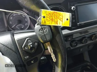 2016 Toyota Tacoma SR5 with VIN 5TFAX5GN2GX059826, listed as a IAAI auction lot 42032005 with 209,271 mi miles. Bid and sale history available at carsss.com. Image 11.