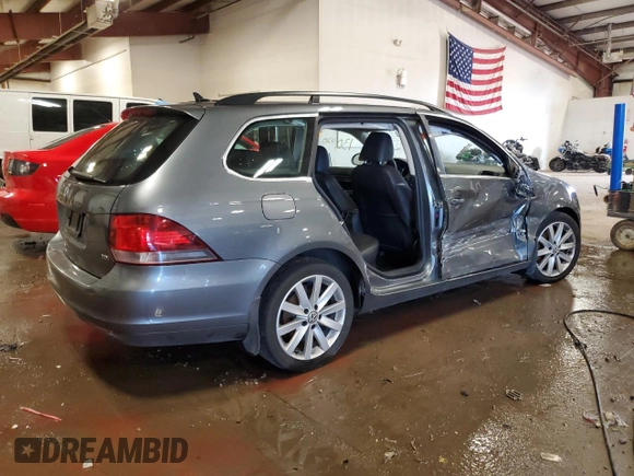 2014 Volkswagen Jetta SportWagen TDI w/Sunroof with VIN 3VWML7AJXEM612961, listed as a Copart auction lot 72834764 with 130,020 mi miles and Salvage Title. Bid and sale history available at carsss.com. Image 3.