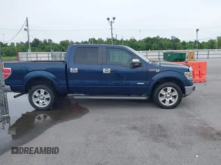 2013 Ford F-150 XL with VIN 1FTFW1ETXDKF51063, listed as a IAAI auction lot 42790441 with 303,665 mi miles and . Bid and sale history available at DreamBid. Image 13.