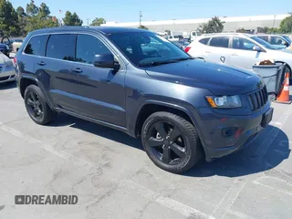 2015 Jeep Grand Cherokee Altitude z VIN 1C4RJFAG1FC607566, wystawiony jako IAAI lot #42586710 z przebiegiem 148 108 mil mil oraz . Historia ofert i sprzedaży dostępna na DreamBid. Obrazek 1.