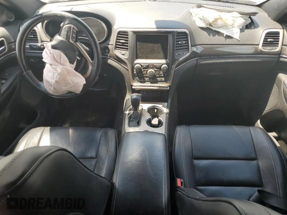 2017 Jeep Grand Cherokee Overland with VIN 1C4RJFCGXHC823593, listed as a Copart auction lot 58727205 with Not provided miles and Salvage title. Bid and sale history available at DreamBid. Image 8.