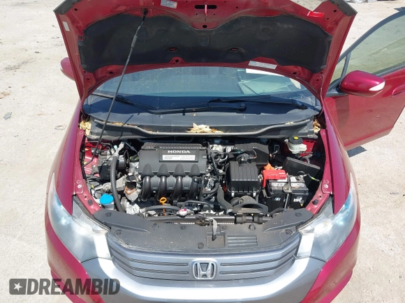 2010 Honda Insight EX with VIN JHMZE2H73AS009253, listed as a IAAI auction lot 41882569 with 104,839 mi miles and . Bid and sale history available at DreamBid. Image 10.
