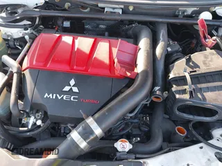 2014 Mitsubishi Lancer Evolution MR with VIN JA32W5FV5EU017592, listed as a IAAI auction lot 41158408 with 97,614 mi miles. Bid and sale history available at carsss.com. Image 10.