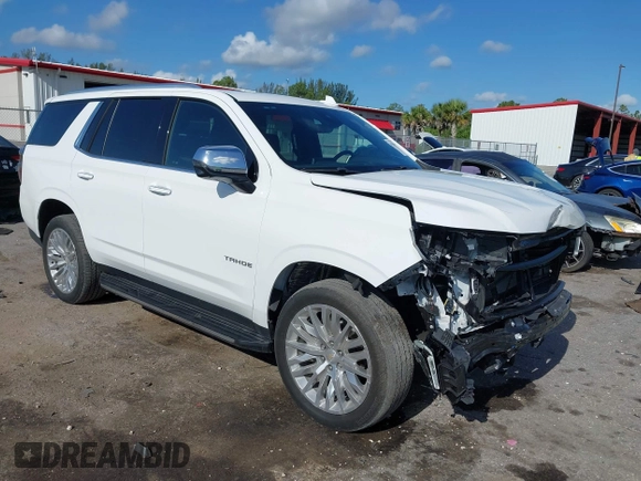 2023 Chevrolet Tahoe Premier with VIN 1GNSKSKD0PR453465, listed as a IAAI auction lot 42512099 with 23,252 mi miles and . Bid and sale history available at DreamBid. Image 1.