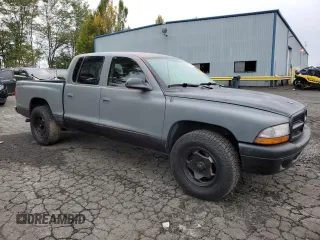 2003 Dodge Dakota Sport with VIN 1D7HL38N63S192308, listed as a Copart auction lot 77494684 with 128,512 mi miles and Salvage Title. Bid and sale history available at carsss.com. Image 4.