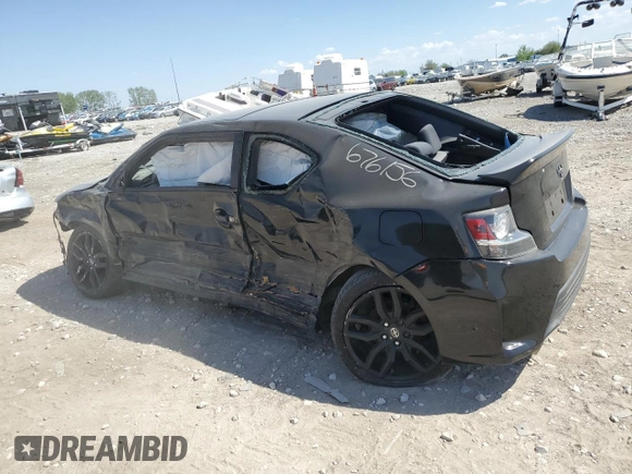 2014 Scion tC z VIN JTKJF5C79E3079580, wystawiony jako Copart lot #78163654 z przebiegiem Nie podano mil oraz Szkody całkowita. Historia ofert i sprzedaży dostępna na DreamBid. Obrazek 2.
