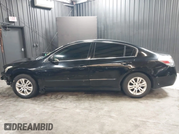 2011 Nissan Altima S with VIN 1N4AL2AP9BN440121, listed as a IAAI auction lot 41863583 with 169,017 mi miles and . Bid and sale history available at DreamBid. Image 14.