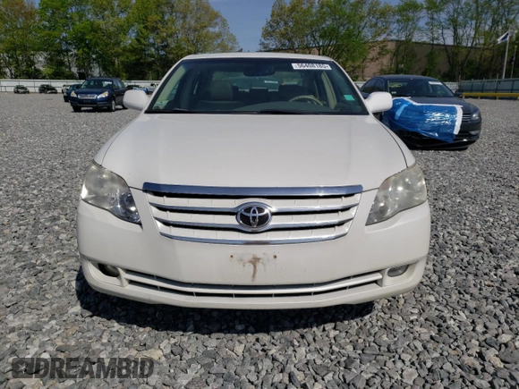 2007 Toyota Avalon XL z VIN 4T1BK36B27U215021, wystawiony jako Copart lot #56408185 z przebiegiem 202 572 mil mil oraz Czysty tytuł • Clean title. Historia ofert i sprzedaży dostępna na DreamBid. Obrazek 5.