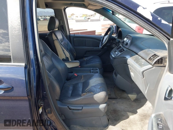 2005 Honda Odyssey EX-L with VIN 5FNRL38755B007567, listed as a IAAI auction lot 41952348 with 183,514 mi miles and . Bid and sale history available at carsss.com. Image 5.