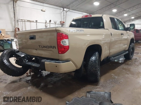 2017 Toyota Tundra SR z VIN 5TFUY5F19HX583033, wystawiony jako IAAI lot #41484920 z przebiegiem 112 206 mil mil oraz . Historia ofert i sprzedaży dostępna na DreamBid. Obrazek 4.
