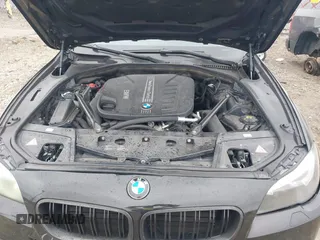 2014 BMW 5 Series 535d with VIN WBAXA5C51ED691018, listed as a IAAI auction lot 41887112 with 174,684 mi miles and . Bid and sale history available at carsss.com. Image 10.