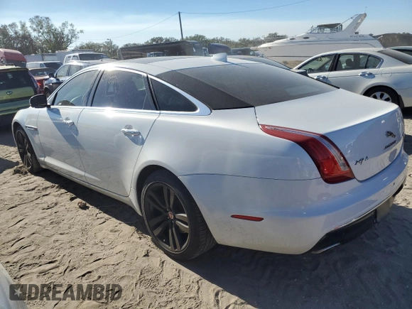2016 Jaguar XJ Portfolio with VIN SAJWA2G72G8W00103, listed as a Copart auction lot 81347664 with 45,917 mi miles and Salvage title. Bid and sale history available at DreamBid. Image 2.