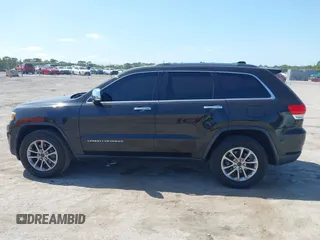 2015 Jeep Grand Cherokee Limited with VIN 1C4RJFBG8FC790575, listed as a IAAI auction lot 42124709 with 248,827 mi miles. Bid and sale history available at carsss.com. Image 14.