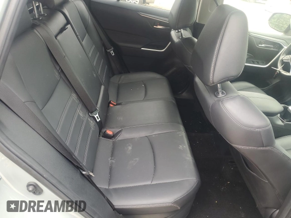2023 Toyota RAV4 Hybrid XLE Premium with VIN JTMB6RFV8PD097109, listed as a Copart auction lot 59970995 with 43,197 mi miles and Salvage title. Bid and sale history available at DreamBid. Image 10.