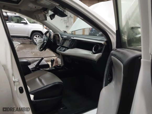 2018 Toyota RAV4 Limited with VIN JTMDFREV6JJ186499, listed as a IAAI auction lot 41668544 with 130,336 mi miles. Bid and sale history available at carsss.com. Image 5.