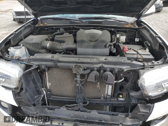 2023 Toyota Tacoma SR with VIN 3TMCZ5AN2PM577873, listed as a Copart auction lot 57361315 with 50,110 mi miles and Salvage title. Bid and sale history available at DreamBid. Image 11.
