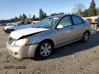 2006 Kia Spectra EX with VIN KNAFE122X65278395, listed as a Copart auction lot 51773205 with 243,978 mi miles and Salvage Title. Bid and sale history available at carsss.com. Image 1.