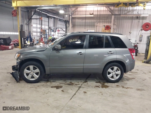 2010 Suzuki Grand Vitara Limited with VIN JS3TD0D76A4100026, listed as a IAAI auction lot 41622236 with 97,264 mi miles. Bid and sale history available at carsss.com. Image 14.