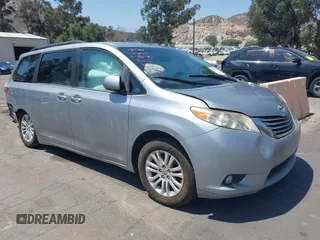 2015 Toyota Sienna XLE with VIN 5TDYK3DC0FS589947, listed as a IAAI auction lot 36567379 with 130,969 mi miles and . Bid and sale history available at DreamBid. Image 1.